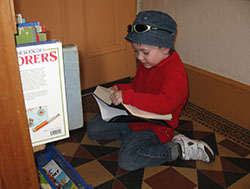 Jasper looking at books